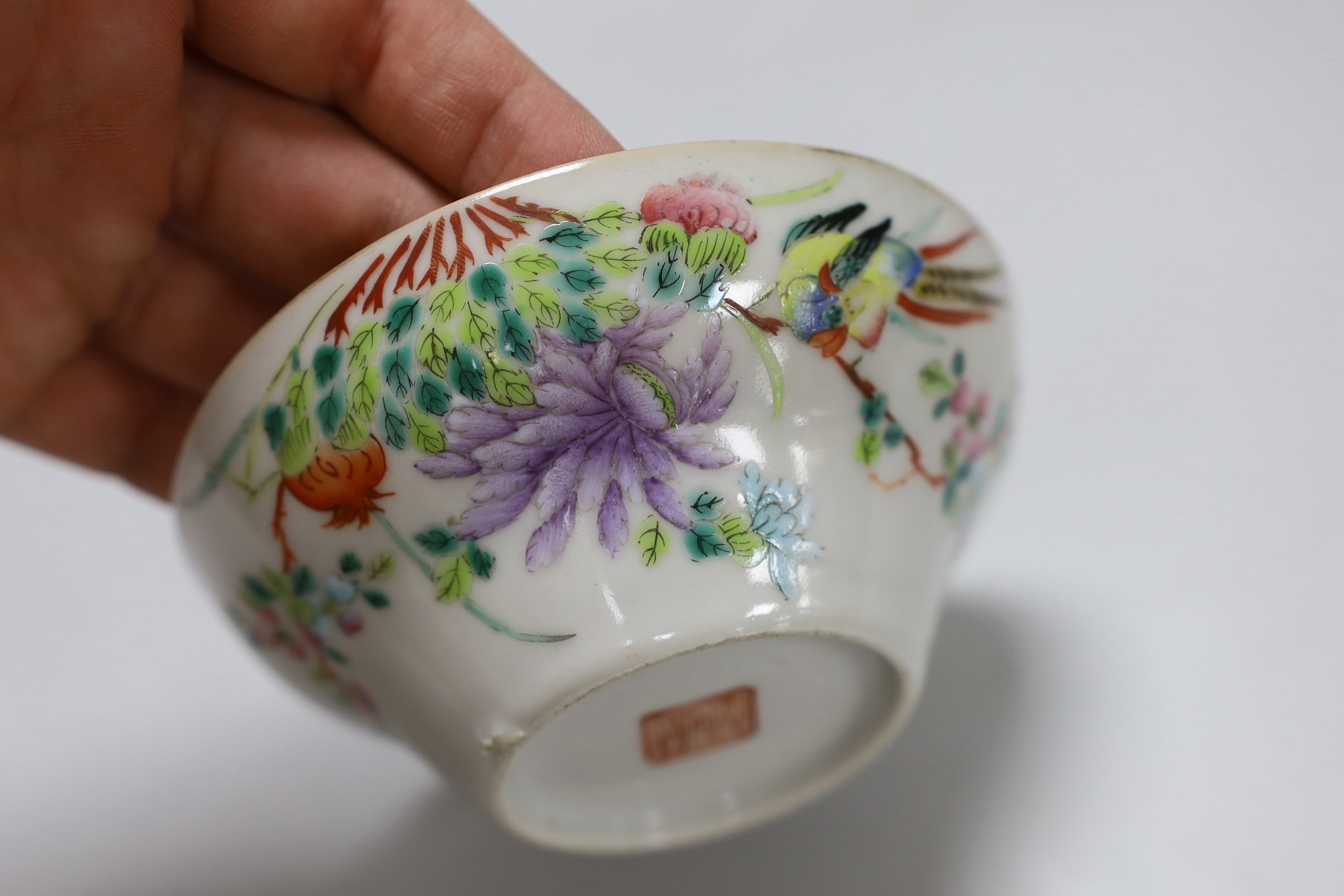 A Chinese blue and white saucer, together with a ‘dragon and phoenix’ saucer and a famille rose bowl